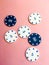 Chips for poker on pink background. Five and fifty chips