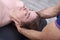 Chiropractic getting mobilization cervical spine of a woman. Manual therapy. Neurological physical examination. Osteopathy,