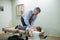 Chiropractor Adjusting Child in Office