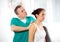 Chiropractor massage the female patient spine and back