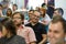 Chisinau, Republic of Moldova - July 02, 2018: audience in hall at a business conference. Participants happily laugh.