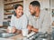 Chit-chats over a lovely cuppa. Shot of a young couple drinking coffee together in the kitchen at home.