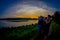 CHITWAN, NEPAL - NOVEMBER 03, 2017: Unidentified people at outdoors enjoying the beautiful sunset in Chitwan National