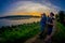 CHITWAN, NEPAL - NOVEMBER 03, 2017: Unidentified people at outdoors enjoying the beautiful sunset in Chitwan National