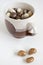 Chocolate balls with nuts on light background