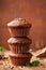 Chocolate banana muffin on wooden background. Delicious homemade bakery.