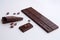 chocolate bar, cut in half to reveal steps of its creation