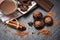 Chocolate bar and spice on the dark background / chocolate ball and chocolate pieces chunks chips powder candy sweet dessert for