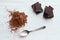 Chocolate bars with heap of cacao powder