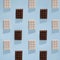 Chocolate bars with shadows making pattern. Flat lay sweet food aesthetic concept design. Sweets idea on a soft blue