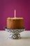 Chocolate Birthday Cake With Almond Flakes And Candle