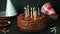 Chocolate birthday cake with candles. Party cake. Light candles. Make a wish. Happy birthday concept. Chocolate cake. Birthday par