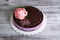 Chocolate blueberry cheesecake with chocolate peony and isomalt