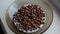 Chocolate breakfast cereals with yogurt in a plate