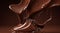 chocolate on a brown background, liquid chocolate on abstract backgroumd, pouring chocolate on brown background