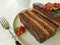 Chocolate brown cake, red currant, mint tasty cutting baked dish seasoning pastry plate white wooden