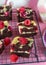 Chocolate brownie with cream cheese and raspberries