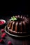 Chocolate bundt cake decorated with chocolate glaze, raspberries and mint