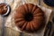 Chocolate bundt cake dusted with cocoa powder