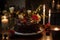 chocolate cake being brought to table, with candles and floral centerpiece for special occasion