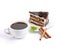 Chocolate cake, coffee and green leafage