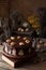 Chocolate cake dark food mystery composition with book and walnuts