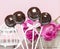 Chocolate cake pops on pink romantic background