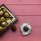 Chocolate candies, wrapped in golden foil