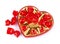 Chocolate candy in a heart-shaped box for Valentine`s Day on a white background