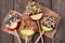 Chocolate and caramel dipped apple rounds, above on rustic wood