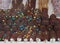 Chocolate Caramel Marshmallow with chocolate sprinkles on a wooden stick