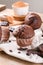 Chocolate carob cupcakes with carob pods and carob powder