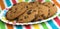 Chocolate chip cookies on colourful background