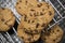 Chocolate chip cookies on dark background. Choco cookie black slate board