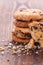 Chocolate chip cookies on dark old wooden table freshly baked. Selective Focus.