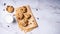 Chocolate chip cookies with a glass of milk on a marble background