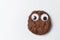 Chocolate chip cookies with Googly eyes on white background. Cookies character