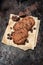 Chocolate chip cookies on rusty metal baking sheet