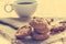 Chocolate chip cookies on sack on wooden table, Vintage color