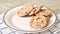 Chocolate chip cookies vanishing from a plate