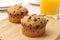 Chocolate chip muffins with orange juice