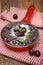Chocolate clafoutis with cherries in a frying pan