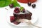 Chocolate clafoutis with cherries and powdered sugar