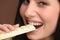 Chocolate - close-up of young woman enjoy sweets