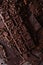 Chocolate, coffee beans. and cocoa powder. Chocolate bar pieces. dark chocolate background. A large bar of chocolate