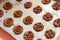 chocolate cookie dough with choco chip in iron plate before baking