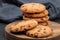 Chocolate cookie wooden background, close