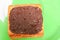 Chocolate on cookies bread square macro focus in the plate