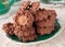 Chocolate cookies on green saucer