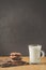 Chocolate cookies and mug glass of milk on wooden table/Chocolate cookies and mug glass of milk on wooden table and dark